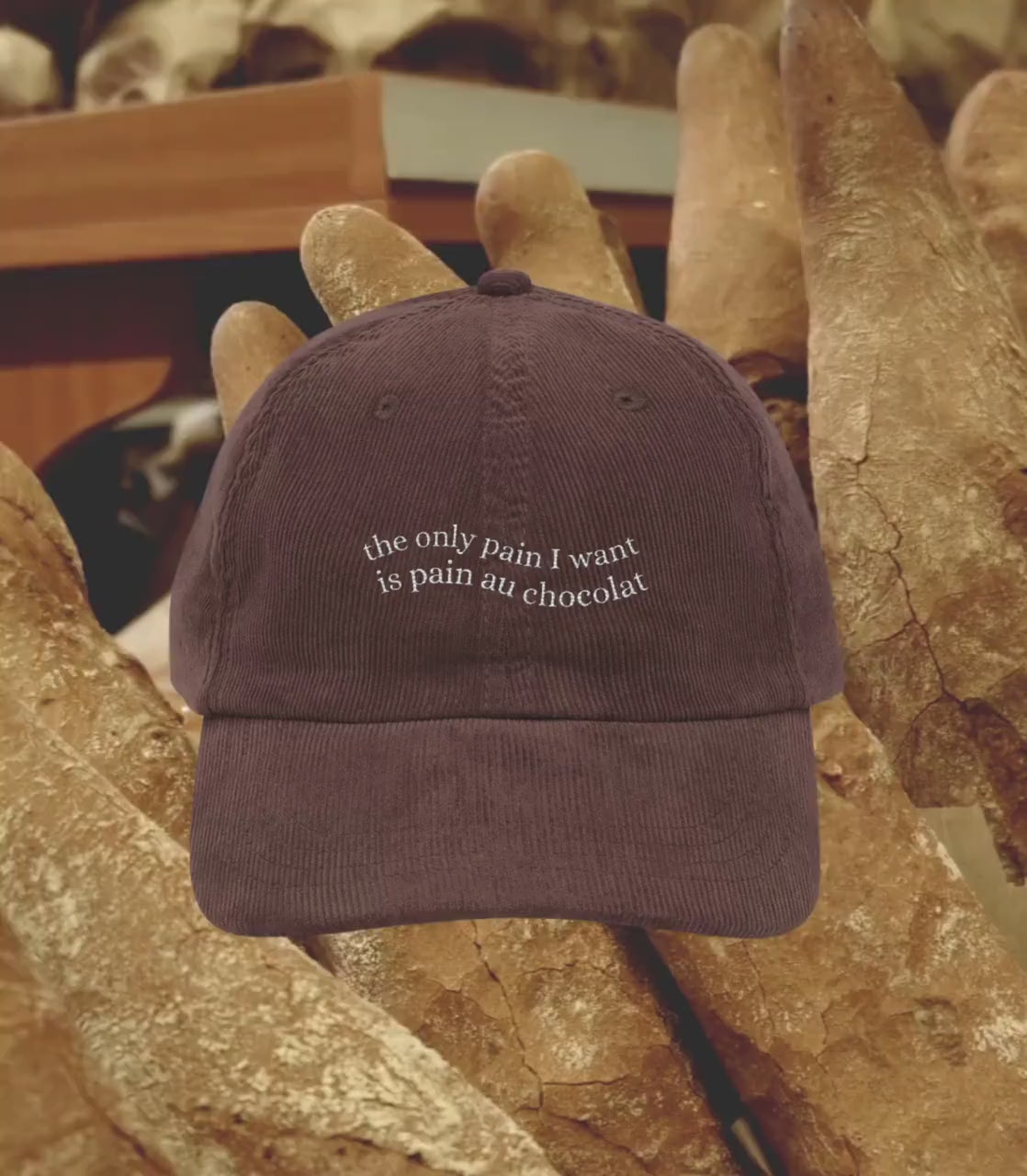 The only pain I want is pain au chocolat embroidered corduroy cap dad hat * Pinterest trendy coquette aesthetic cozy foodie wavy letters